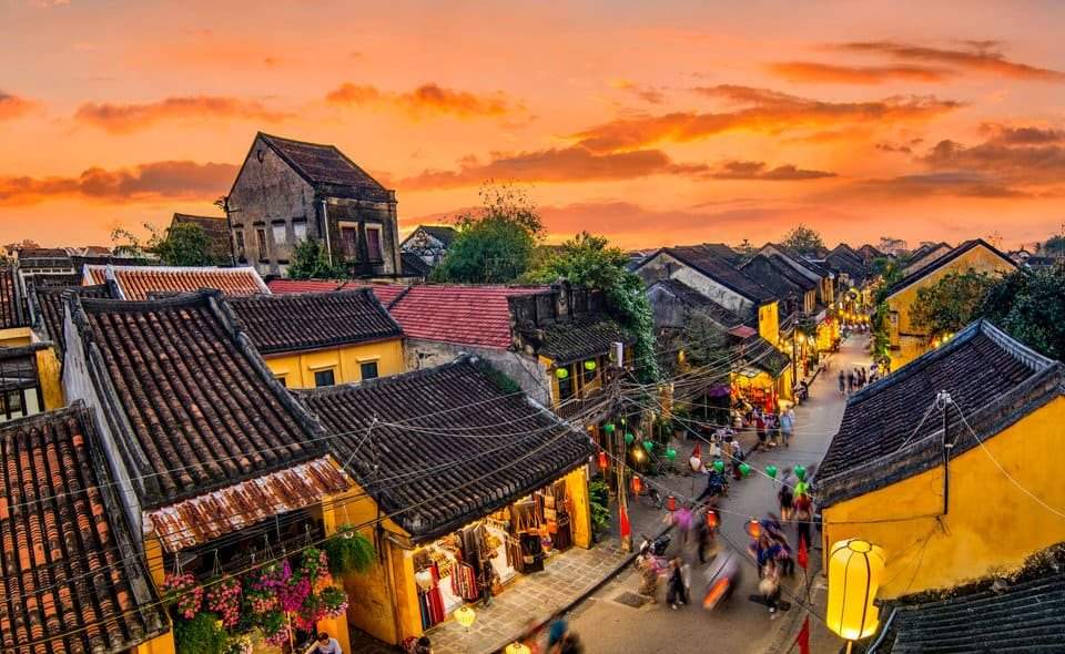 Hoi An rooftops and lantern-lit lanes at dusk